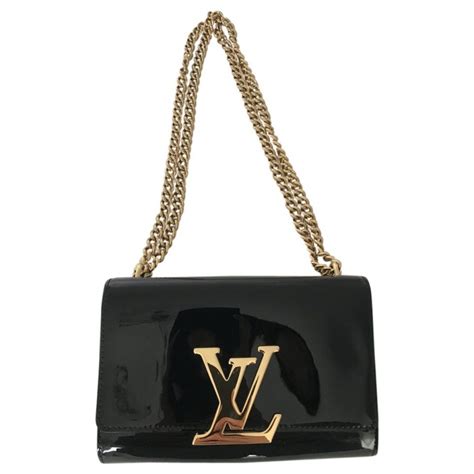 louis vuitton clutch hire